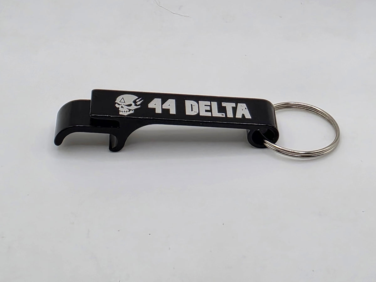 Black aluminum keychain bottle opener engraved with the 44 Delta skull and logo